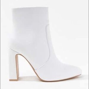 white zip up block heel booties